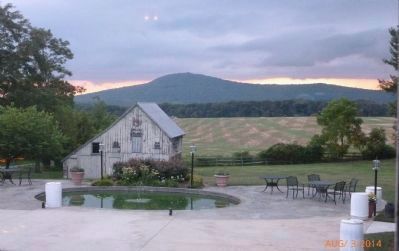 Sugarloaf Mountain in the background - view northward from the patio behind the Historic Comus Inn. Click for full size. Sugarloaf Mountain in the background - view northward from the patio behind the Historic Comus Inn image. Click for full size.