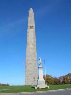 Colonel Seth Warner Memorial and Bennington Monument image. Click for full size.
