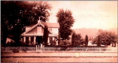 This picture was taken in 1900. Members of the Shaw family can be seen standing on the front porch. image. Click for full size.