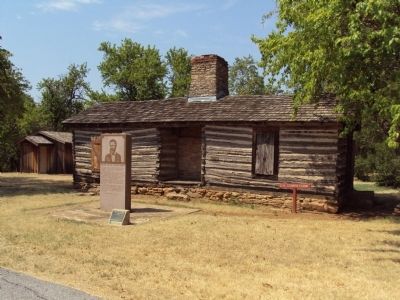 Marker with Douglas Cooper Cabin image. Click for full size.