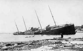 The S.S. Imo blown ashore by the explosion. image. Click for full size.