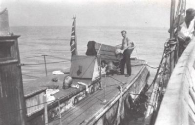 Transferring cargo to a rum runner. image. Click for full size.