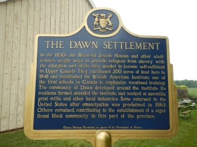 The Dawn Settlement Marker (English side) image. Click for full size.