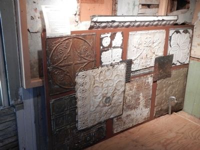 Examples of pressed tin found inside the Sinclair Inn. image. Click for full size.