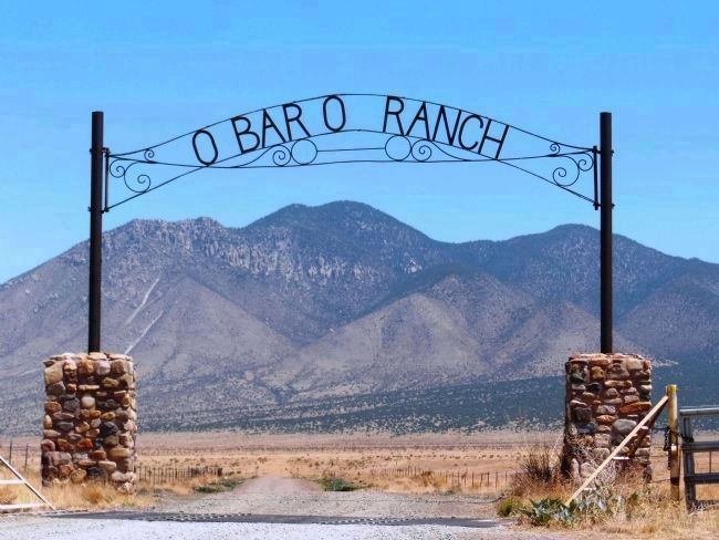 Carrizo Peak, framed by O-Bar-O Ranch Entrance, Capitan, New Mexico image. Click for full size.