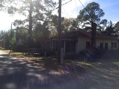 Looking southward at marker in front of residential house.. Click for full size. Looking southward at marker in front of residential house. image. Click for full size.