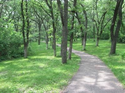 Paved Walkway Leading to Marker and Beach. Click for full size. Paved Walkway Leading to Marker and Beach image. Click for full size.