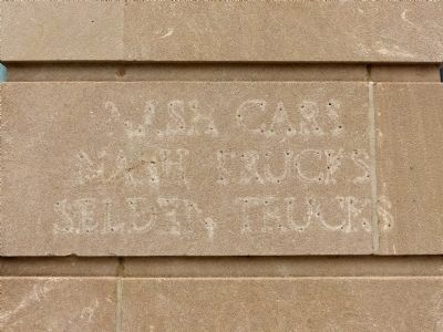 Etched into the corner of the building image. Click for full size.