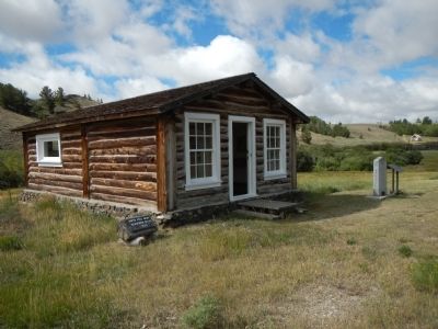 E.A. Slack Cabine and Esther Morris Monument. Click for full size. E.A. Slack Cabine and Esther Morris Monument image. Click for full size.