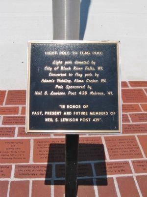 Light Pole to Flag Pole Plaque image. Click for full size.