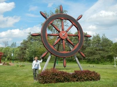 The World's Largest Ship's Wheel located in A.A. MacDonald Memorial Garden image. Click for full size.