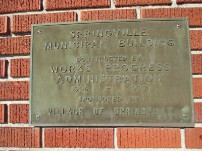 Plaque on the Municipal Building at the Marker Site image. Click for full size.