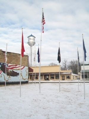 War Memorial Mural and Flags image. Click for full size.