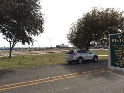 View of Gulf of Mexico and Highway 90 near marker. image. Click for full size.