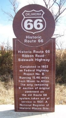 Historic Route 66 Ribbon Road - Sidewalk Highway Marker image. Click for full size.