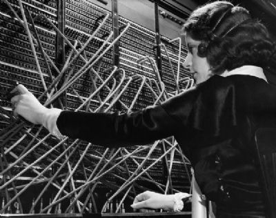 Telephone Operator at Work image. Click for full size.
