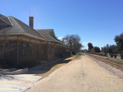 Train Depot along railroad tracks. image. Click for full size.