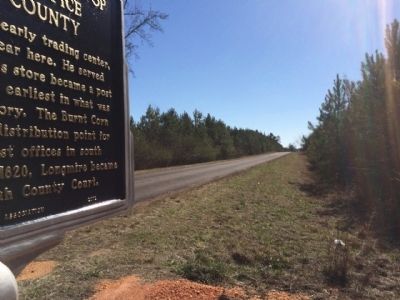 View of marker looking south on CR-5. image. Click for full size.