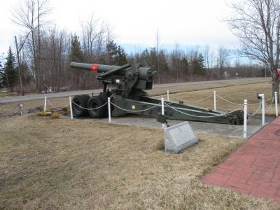 Gun is Right of the Memorial Stone image. Click for full size.