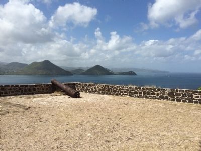 Fort Rodney cannon with a view south to the Pitons. image. Click for full size.