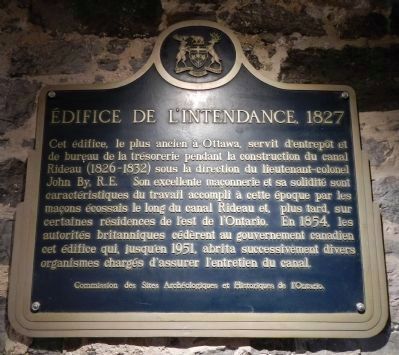 Edifice de l’Intendance, 1827 plaque, located inside the building image. Click for full size.