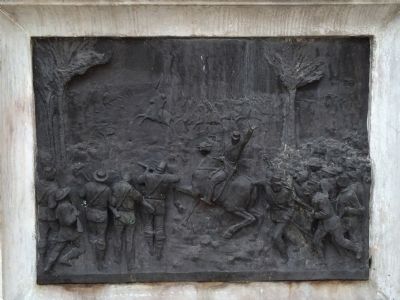 Bronze relief of the Battle of Las Charcas image. Click for full size.