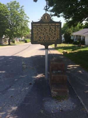 Horse-mounting block in front of marker. image. Click for full size.
