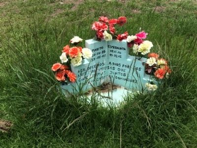Small monument to two victims of the landslide image. Click for full size.