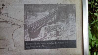 The use of wire cable attached to eyebars was developed by Roebling image. Click for full size.