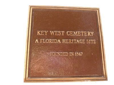 Key West Cemetery Plaze on Gate image. Click for full size.