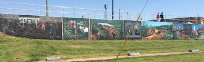 Wide shot of murals behind Simpson County Tourism Office. image. Click for full size.