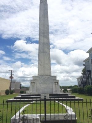 Monument with Alabama state outline in front. image. Click for full size.