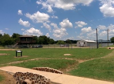 Reconstructed barracks and tower at Camp Hearne image. Click for full size.