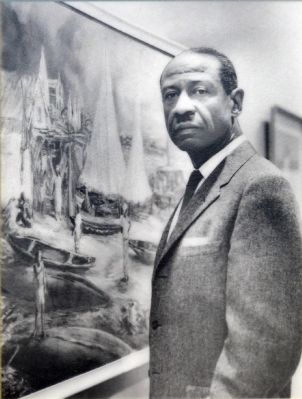 Professor James A. Porter with one of his paintings image. Click for full size.