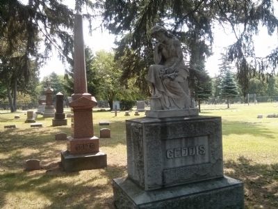 Gravestone with Maiden Holding Flowers image. Click for full size.