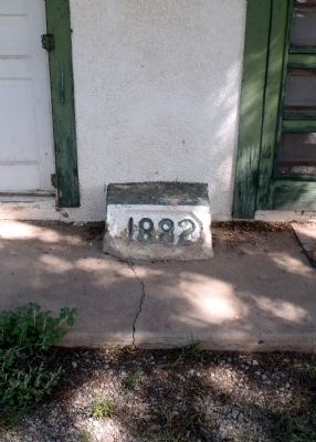 Dated stone outside support building at Fort Stanton stables image. Click for full size.