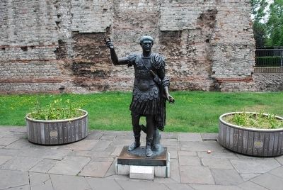 Roman Emperor Trajan Statue with the London Wall in the Background image. Click for full size.