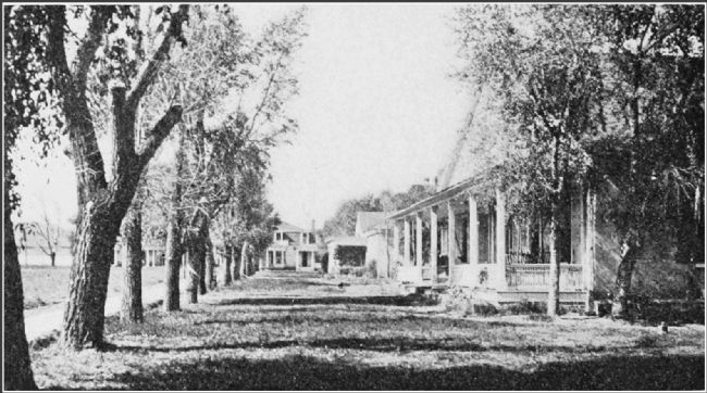 Historic photo of officer's quarters (right forground) described by the marker. image. Click for full size.
