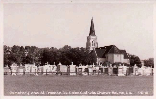 <i>Cemetery and St. Francis De Sales Catholic Church, Houma, La.</i> image. Click for full size.