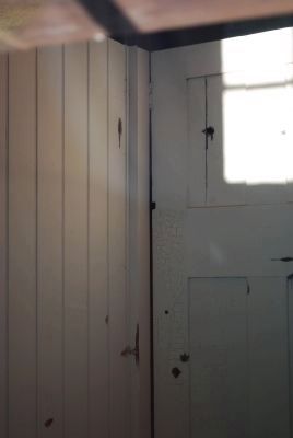 Bullet holes inside the Innis House image. Click for full size.