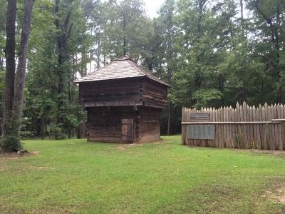 Fort Mims blockhouse and stockade recreation. image. Click for full size.