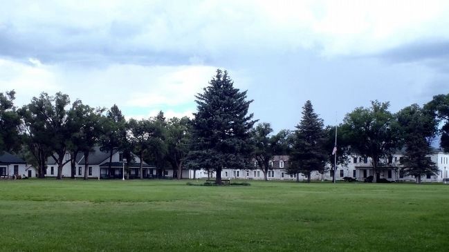 Officers Quarters, Building 4 viewed from across the parade ground looking NE. image. Click for full size.