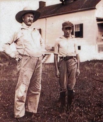 Unidentified Jones Point Lighthouse keeper and boy, circa 1905. image. Click for full size.