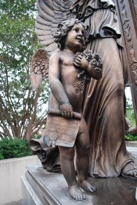 Text on the child's scroll. Click for full size. Text on the child's scroll image. Click for full size.