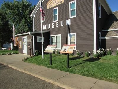 Markers in Medora. Click for full size. Markers in Medora image. Click for full size.