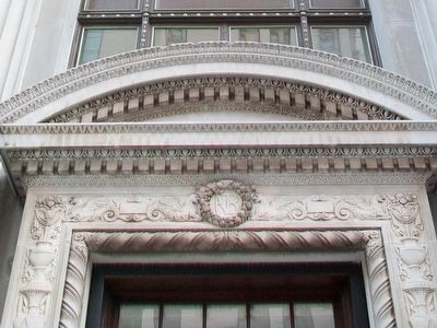 The First National Bank Bldg Entrance Typanum image. Click for full size.