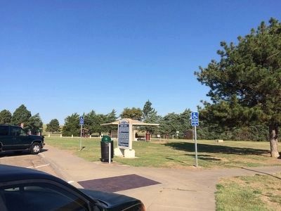 View of marker looking towards rest stop picnic area. image. Click for full size.