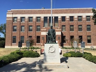 Marker is second from left in front of Garza County Courthouse. image. Click for full size.