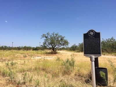 View of marker looking north towards County Road 2121. image. Click for full size.