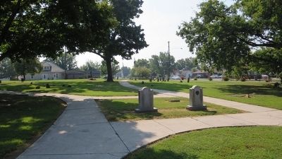 View of a portion of cemetery grave markers.. Click for full size. View of a portion of cemetery grave markers. image. Click for full size.